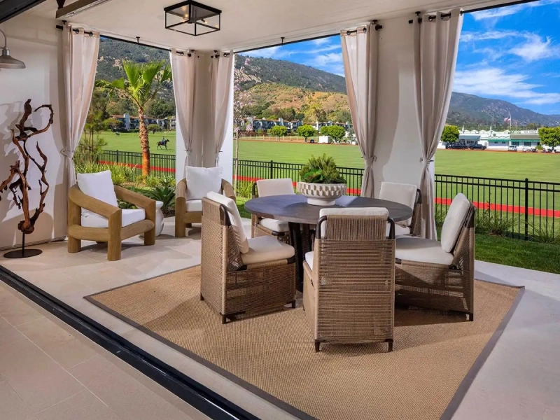 Covered outdoor living area at The Santa Barbara Polo Residences